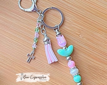 Handmade Tulip Keychain: Iridescent Beads, Cross Charm, Beaded Tassel
