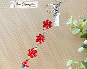 Handmade, floral beaded keychain!  Lobster or swivel clasp, and a mushroom charm