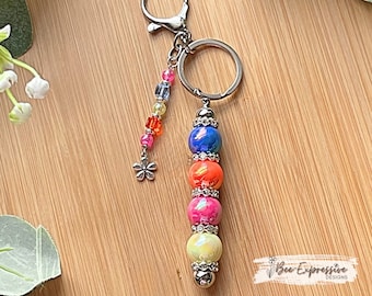 Handmade Iridescent Beaded Keychain: Rhinestone Spacers, Flower Charm