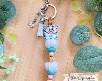 Handmade Cow Keychain: Beaded Tassel, Butterfly Charm
