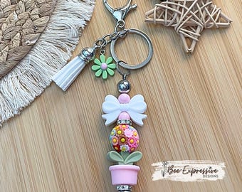 Handmade Flower Beaded Keychain: Daisy Charm, Silicone Bow & Tassel