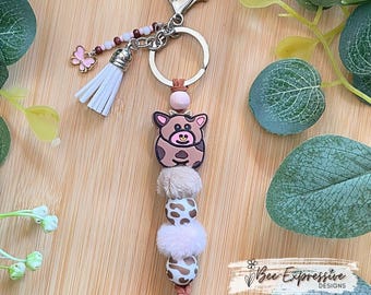 Handmade Cow Keychain: Furry & Silicone Beads with Butterfly Charm