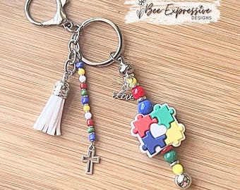 Autism Awareness Beaded Keychain: Puzzle Piece Charm, Acrylic Tassel with a Cross Charm