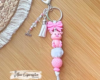 The 3D Pig Keychain: Beaded Tassel, Rhinestone & Silicone Bow