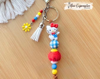 Handmade, Kitty Keychain: silicone beads, suede cord, beaded tassel with daisy charm!