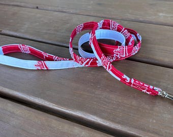 Dog leash made with red/white themed fabric