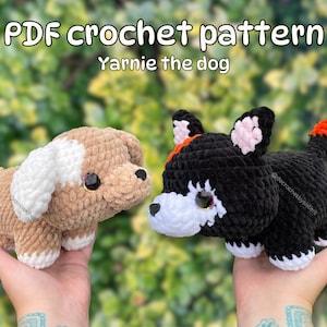 May include: PDF crochet pattern for a crocheted dog named "Yarnie the dog". The pattern includes two dogs, one brown and white and one black and white.