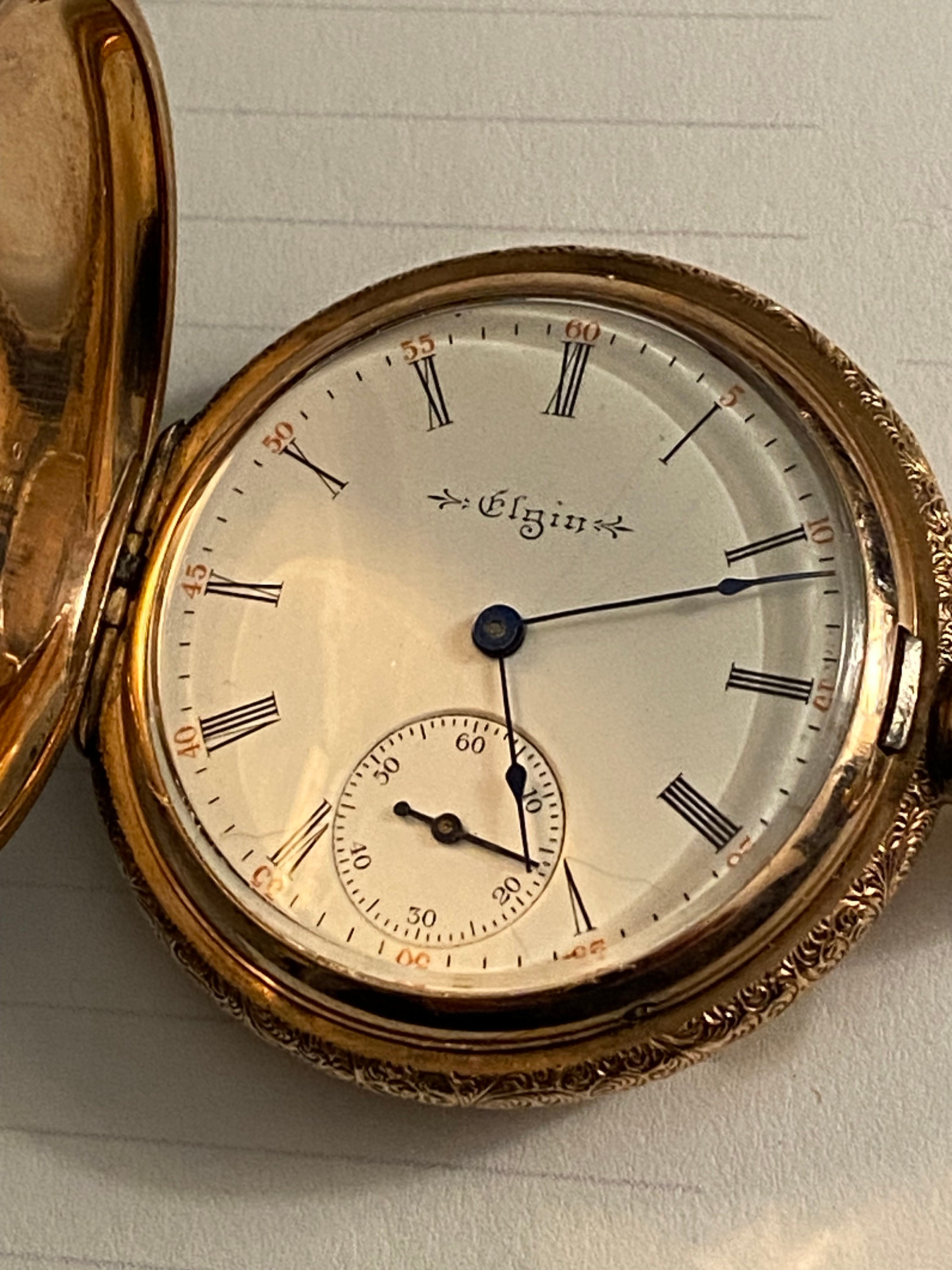 Elgin gold watch clearance value