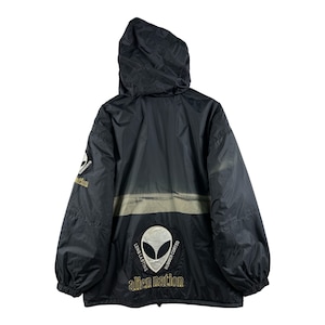 May include: Black hooded jacket with a silver stripe across the bottom. The back of the jacket features a large alien head graphic with the text "Long Lasting Rubber Coated Alien Nation".