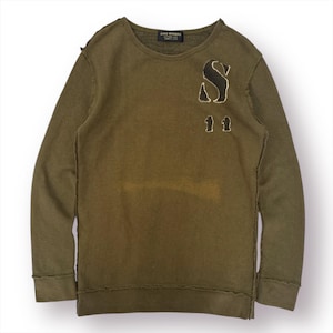 May include: Olive green sweatshirt with a distressed design. Features a large black "S" and the numbers "11" on the front. The sweatshirt has a crew neck and long sleeves. The brand name "FITH WORKS" is printed on the collar.