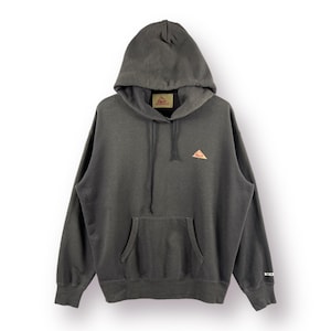 May include: A dark gray hooded sweatshirt with a small embroidered logo on the left chest. The logo is a triangle with the word "KRO" inside. The sweatshirt has a kangaroo pocket and a drawstring hood.