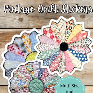 May include: Three vintage quilt stickers in a flower shape, featuring a variety of colorful fabric patterns. The stickers have a white border and are set against a wooden background. Text on the stickers reads "Vintage Quilt Stickers" and "Multi Size and UV Safe."