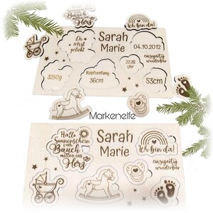 May include: Wooden baby announcement puzzle with a rocking horse, a baby carriage, a pacifier, and footprints. The puzzle pieces are engraved with the text "Hello sunshine from Bauch mitten ins Herz", "Sarah Marie", "Ich bin da!", "04.10.2012", "22:26 Uhr", "3250g", "Kopfumfang 36cm", "einzigartig wunderbar", and "53cm".