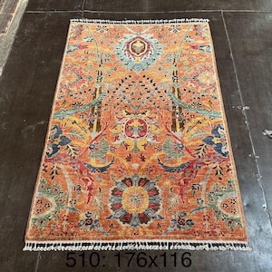 Handmade Afghan Wool Rug: Orange Tribal Oriental Carpet (176x116 cm)