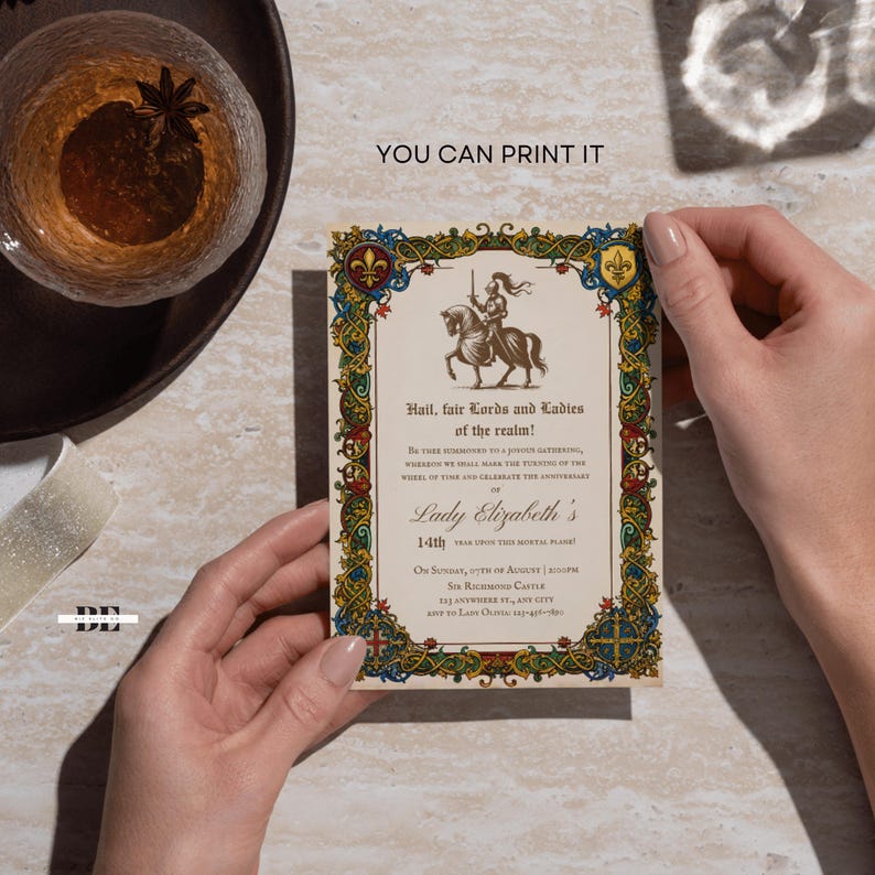 May include: A rectangular invitation card featuring a medieval-style border with intricate blue, red, and gold floral patterns. The centre displays a knight on horseback and text reading Hail, fair Lords and Ladies of the realm! Lady Elizabeth's 14th.