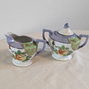 Vintage Japanese Lusterware Sugar and Cream Set. Vibrant and in Mint condition with Floral Handpainted Design.