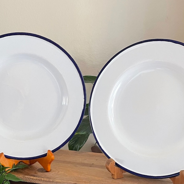 Pair of white ENAMELWARE plates with navy blue trim. Made in Poland, 1970’s