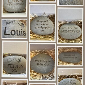 May include: A collection of engraved stones with personalized messages, including names, dates, and loving sentiments. The stones are displayed in small boxes with shredded paper.