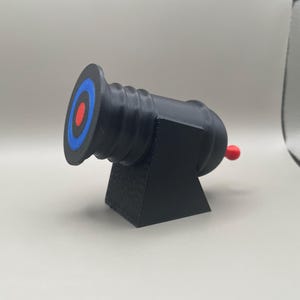 Minikanonspeelgoed: winkelt en lanceert D20-dobbelstenen - accessoire voor rollenspel op tafel
