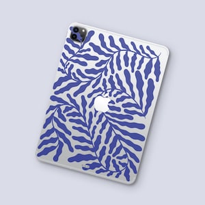 May include: A blue and white phone case with a stylised leaf pattern.