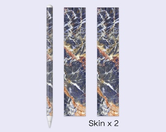 May include: A set of marble-patterned skins for a stylus and two additional pieces. The skins feature a dark blue, brown, and white veined design. The text "Skin x 2" is visible on the bottom right.