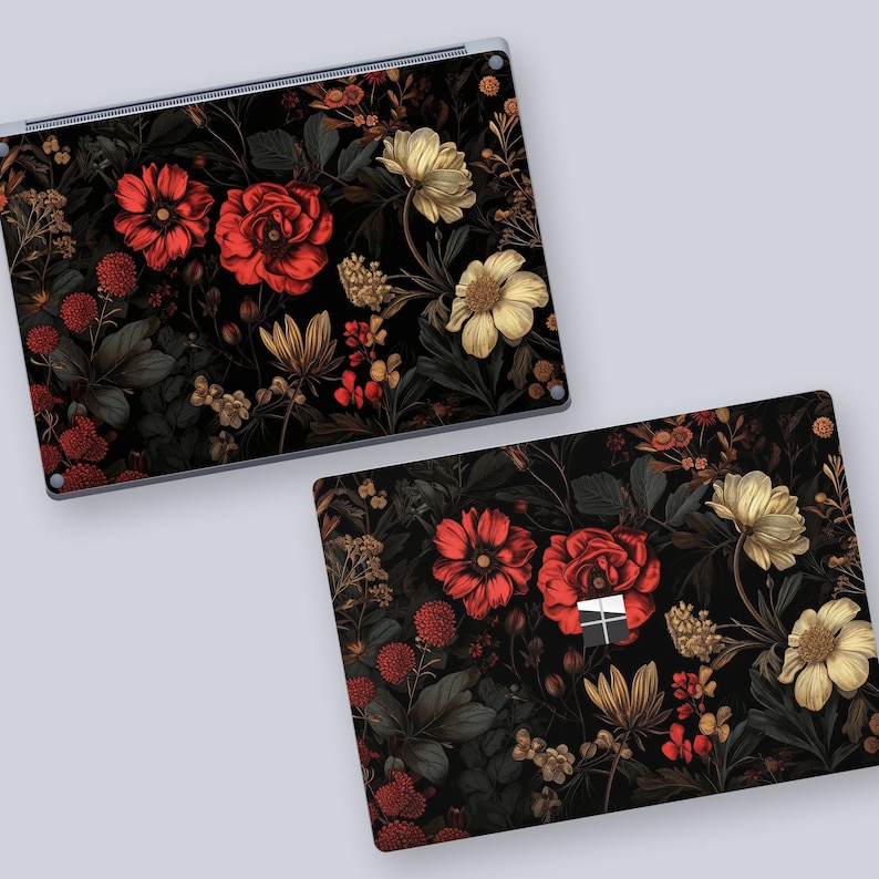 two laptops with floral designs on them