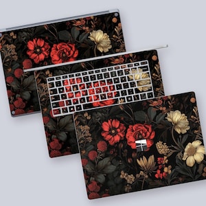 a computer keyboard with a floral design on it