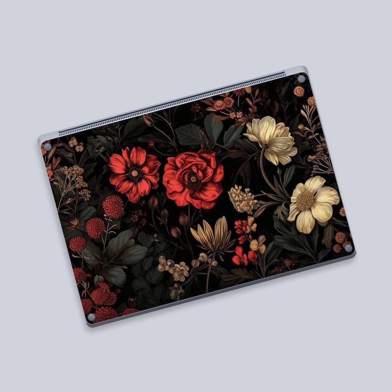 a computer mouse pad with a painting of flowers on it