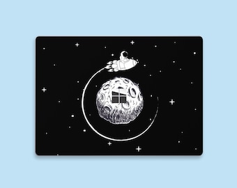 May include: A black and white illustration of an astronaut in a rocket flying around a moon with a Windows logo on it. The background is a black space with white stars.