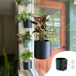 The original Suction Planter: Matte Black | Hangs on tile, window, drywall, fridge, etc. | Self-watering and aerating | Holds 4" nursery pot