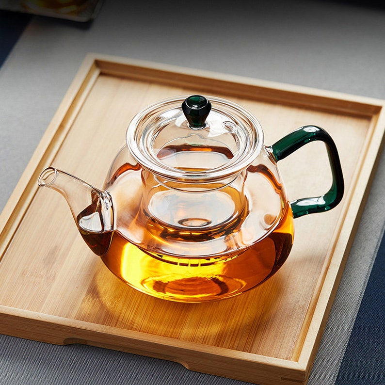 Glass teapot High temperature resistant tea kettle Electric ceramic stove kettle Filter flower teapot Tea set Tea party tea set image 7