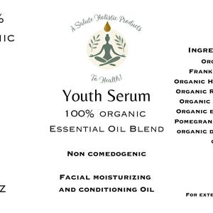 May include: A white label with green text and a logo of a person in a yoga pose with a green leaf design. The text reads "A Salute Holistic Products To Health!" and "Youth Serum 100% Organic Essential Oil Blend". The label also includes the text "100% Organic", "Non Comedogenic", "Facial Moisturising and Conditioning Oil", "1 oz", and "For External Use Only". The ingredients are listed as "Organic Frankincense, Organic Helichrysum, Organic Rose De Mai, Organic Jojoba Oil, Organic Extra Virgin Pomegranate Seed Oil, Organic Dark Castor Oil".