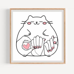 Puede incluir: Impresión enmarcada que muestra un gato de dibujos animados sosteniendo las manos de una persona. El gato es blanco con contornos negros y detalles rosas. Las manos tienen esmalte de uñas rosa y un corazón rosa.
