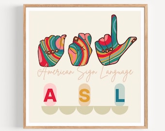 May include: A framed print featuring colorful hand gestures representing letters in American Sign Language. The print includes the text "American Sign Language" and the letters "A", "S", and "L" in a playful font.