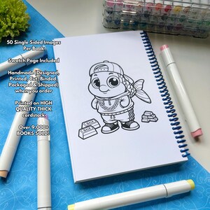 May include: A coloring book with a spiral binding, featuring a cartoon fish character wearing a hat and gold chain. The book is open, displaying the illustration, with markers and text that reads "50 Single Sided Images Per Book".