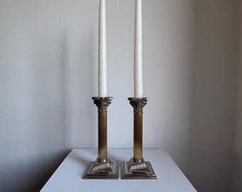 A Pair Of Vintage Silver Plated Corinthian Column Candle Holders