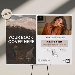 May include: A promotional poster on a black easel. The poster features a book cover mockup with the text "YOUR BOOK COVER HERE" and author information. The poster also includes a photo of the author and details about a book signing event.