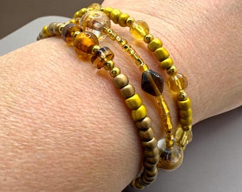 Honey Gold Stacker - Handmade Bronze Memory Wire Bracelet – Golden Brown Glass Beads, Leaf Charm