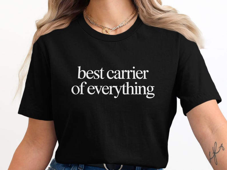 Black t-shirt with white text "best carrier of everything".