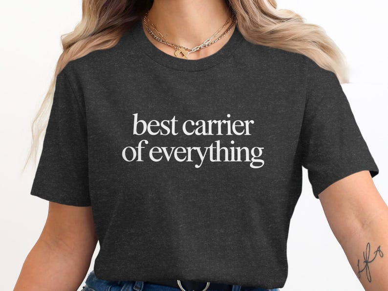 Dark grey t-shirt with "best carrier of everything" in white text.