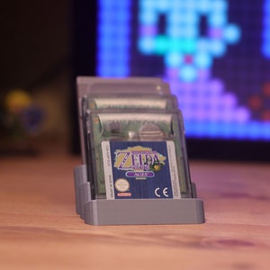 Stojak/uchwyt do wyświetlania kartridży Game Boy - mieści 3 gry, kompatybilny z GB, GBC, GBA