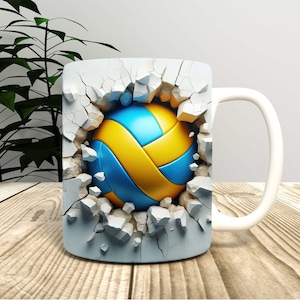 May include: White ceramic mug with a blue and yellow volleyball breaking through a cracked wall design.