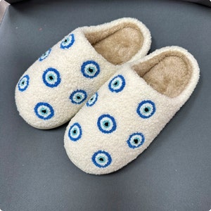 Mini evil eye slippers white fluffy cosy slippers