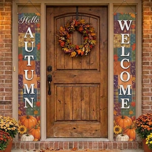 May include: Two vertical porch banners featuring a plaid pattern in autumn colors with pumpkins and sunflowers at the bottom. The left banner displays the text Hello AUTUMN in white, and the right banner displays the text WELCOME in white.