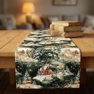 May include: A rectangular table runner featuring a woven winter landscape pattern with red cabins, snow-covered evergreen trees, and golden star accents on a dark green background. The fabric displays a detailed scene of a snowy forest.
