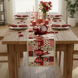 May include: A wooden dining table set for a romantic occasion. The table is adorned with a floral table runner, candles, roses, and a ring box. Plates, napkins, and wine glasses complete the setting, creating a warm and inviting atmosphere.