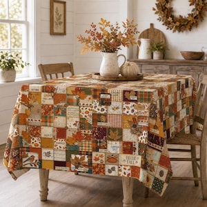 Herfsttafelkleed in patchworkstijl: Tafelkleed voor de herfst met oogstthema, Thanksgiving-decoratie in landelijke stijl.