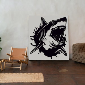 May include: Black and white illustration of a shark with its mouth open, appearing to be breaking through a wall. The shark is in a silhouette style.