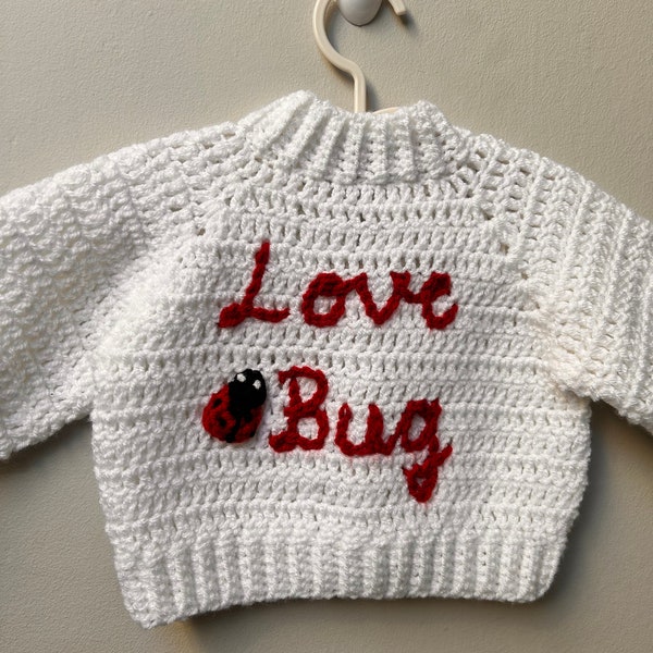 Valentines knitwear handmade cardigans | Perfect newborn or baby shower gift. Love bug. Children’s, toddler and baby valentines gift