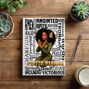 May include: A journal with a woman illustration and the words "Prayer Warrior" in gold. The woman has dark hair with a butterfly and is wearing a green jumpsuit. Surrounding the image are words like "Champion" and "Anointed".